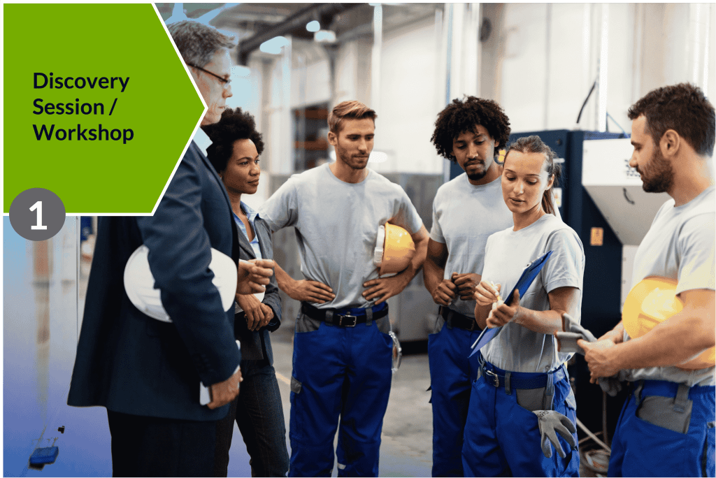 Group of people in safety uniforms having a conversation looking at a tablet